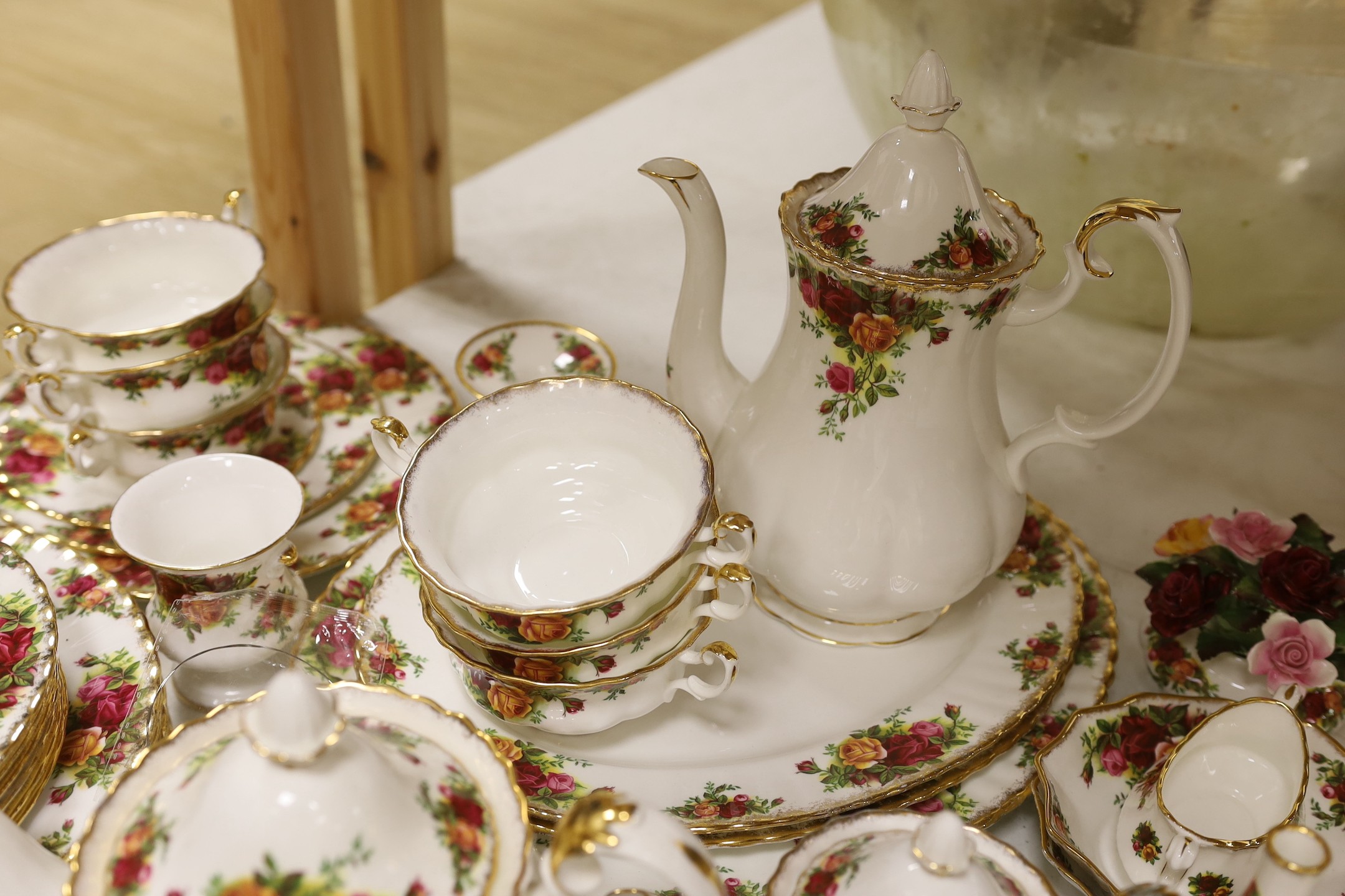 A collection of Royal Albert Old Country Roses tea and dinner service including a collection of vases, pots etc